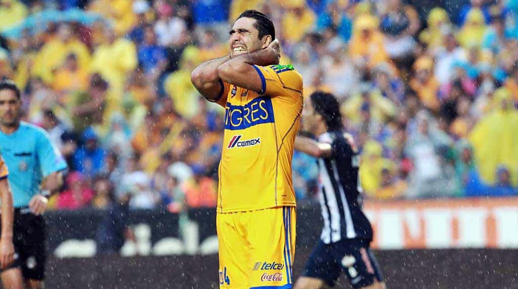 Israel Jiménez seems far from pleased after scoring the own goal that sealed Tigres' defeat against arch-enemy Monterrey.